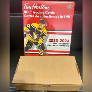 2023-2024 1 full box of hockey cards (sealed/unopened). Comes with album .